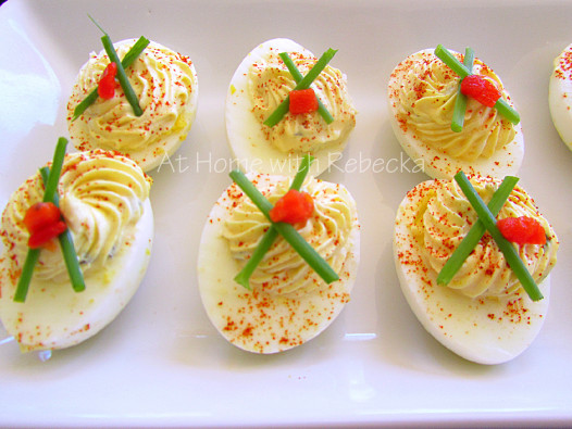 Learn the secrets to cooking perfect hard boiled eggs and get our easy deviled eggs recipe, made with a chive and onion cream cheese filling. So delicious!