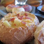 Potato Bacon Cheddar Soup in Sourdough Bread Bowls is a comforting and flavorful cheese soup recipe for fall!