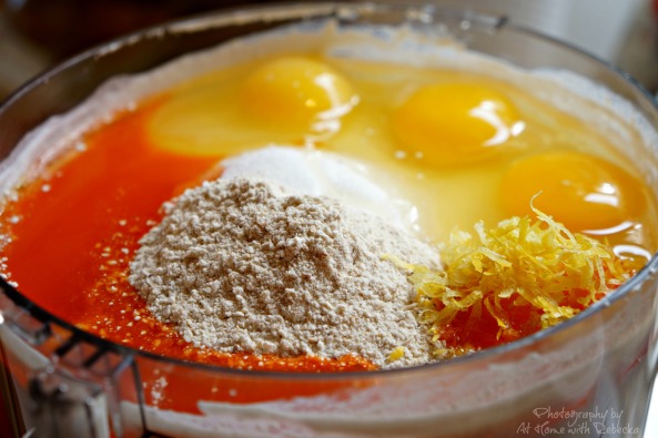 Ingredients to make an orange cream cheesecake