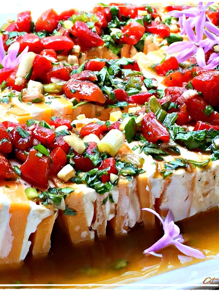 This marinated herb cheese appetizer is the perfect recipe to make for any holiday party or special occasion.