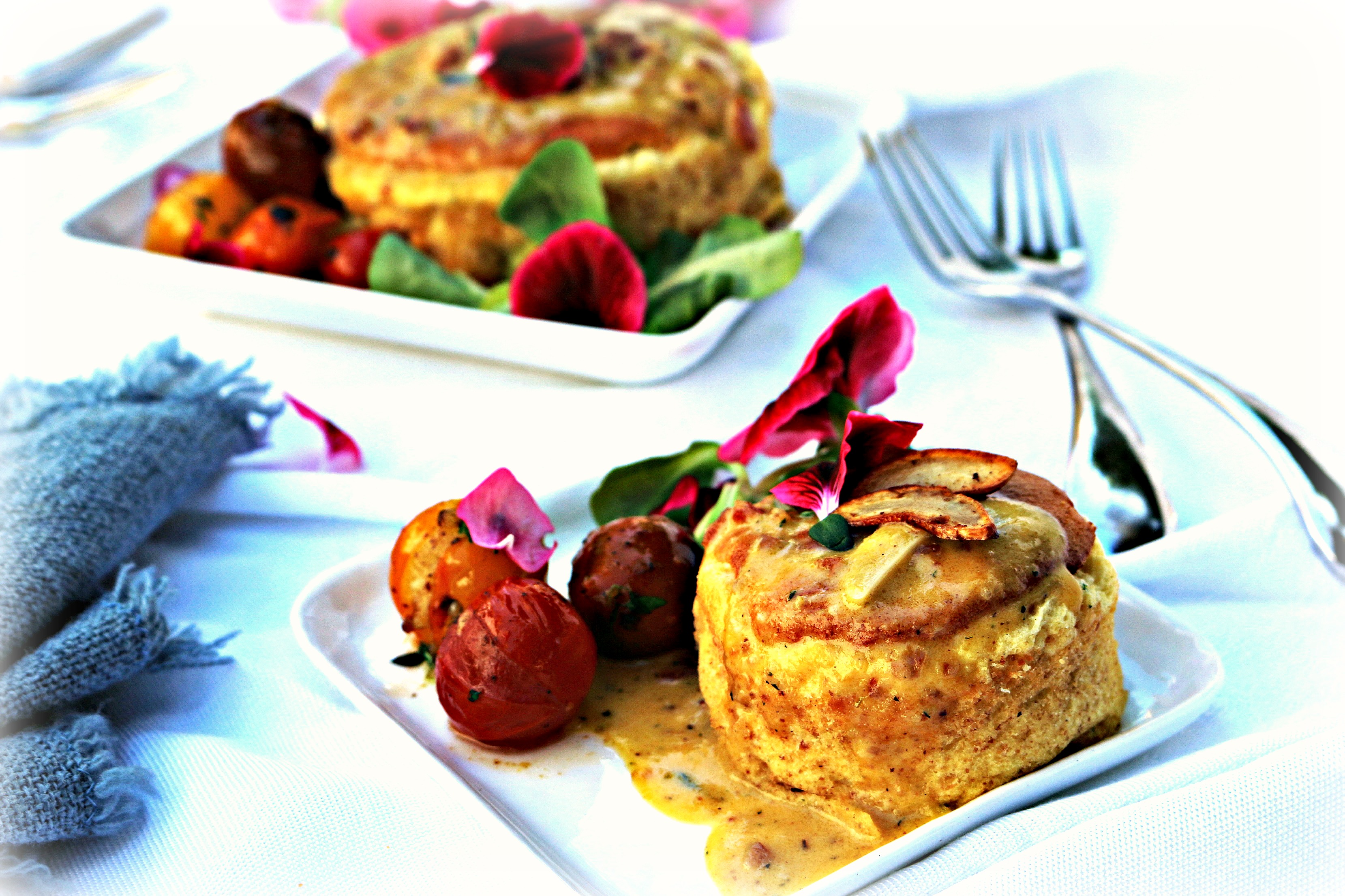 Garlic & Goat Cheese Bacon Soufflé with Creamy Garlic Mustard Sauce and Blistered Garlic Grape Tomatoes